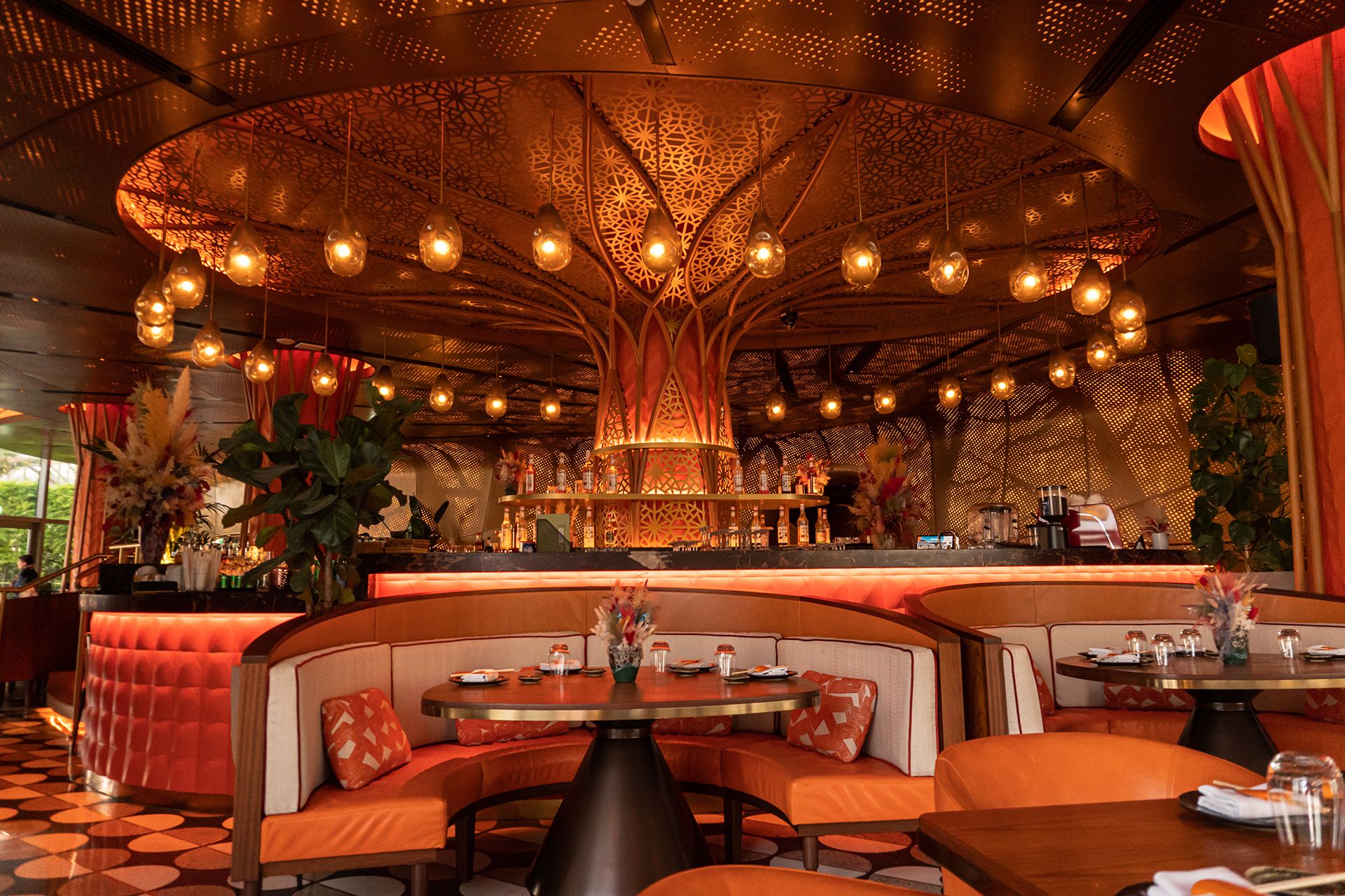 SUSHISAMBA DOHA dining room with a Bar in a background
