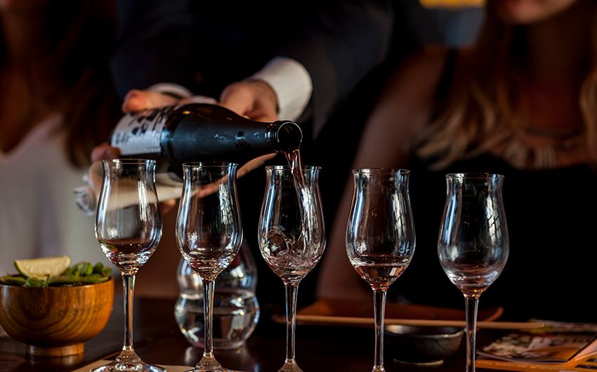 SUSHISAMBA Events, sake flights being poured