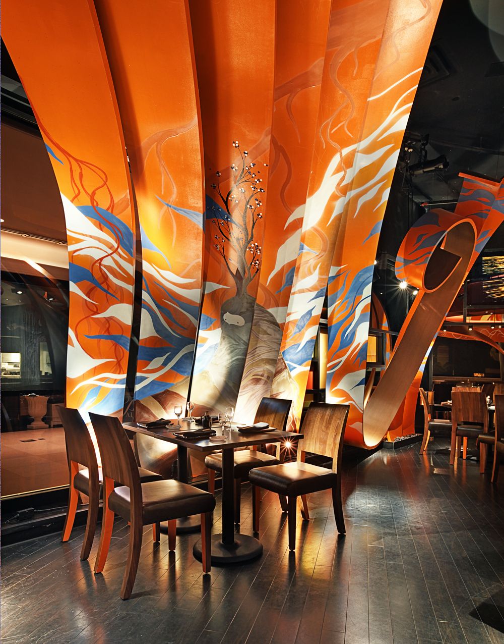 SUSHISAMBA las vegas interior with orange ribbons in the background and dining room table