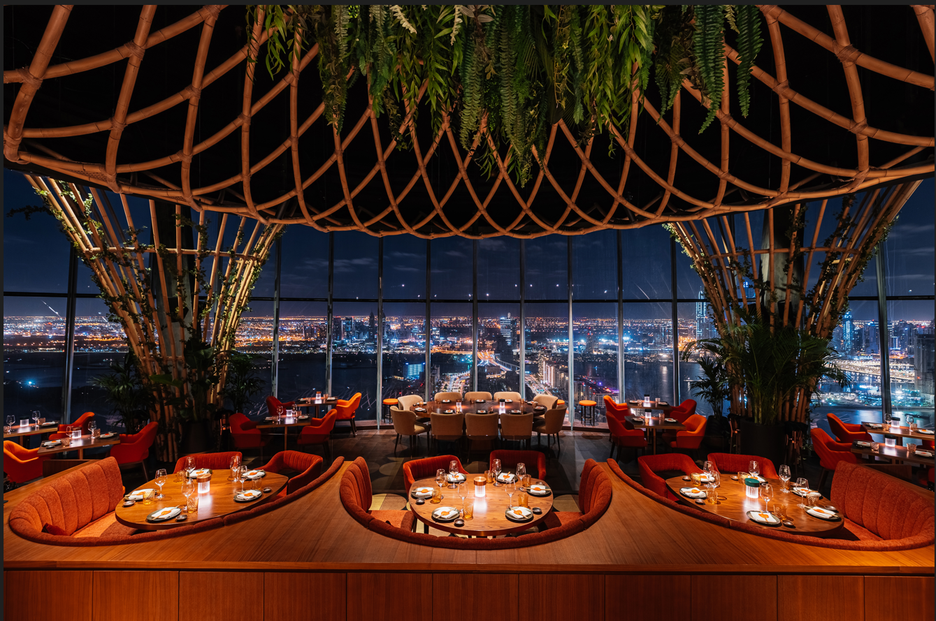 SUSHISAMBA Dubai main dining room at night with a stunning view of the Dubai skyline