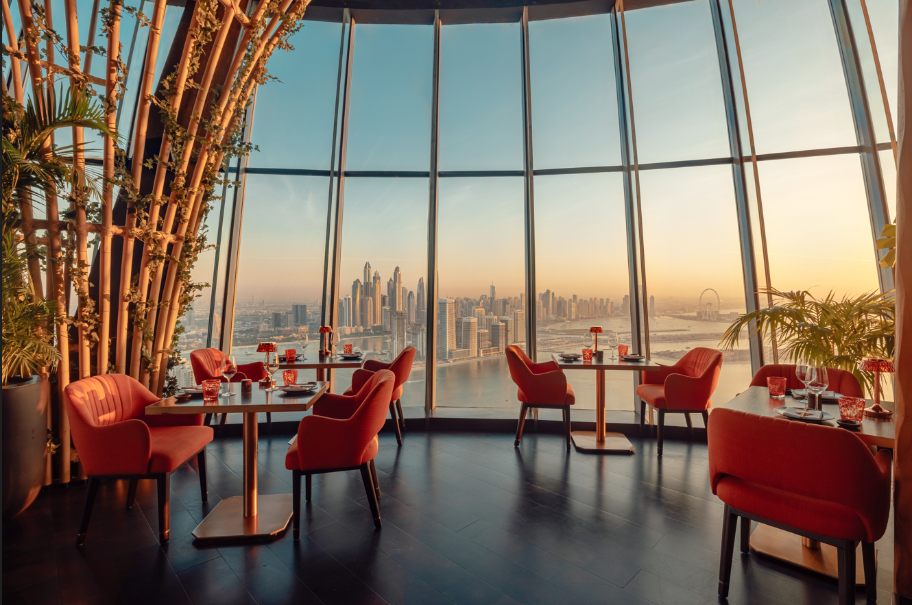 SUSHISAMBA Dubai dining room tables at sunset with stunning glow