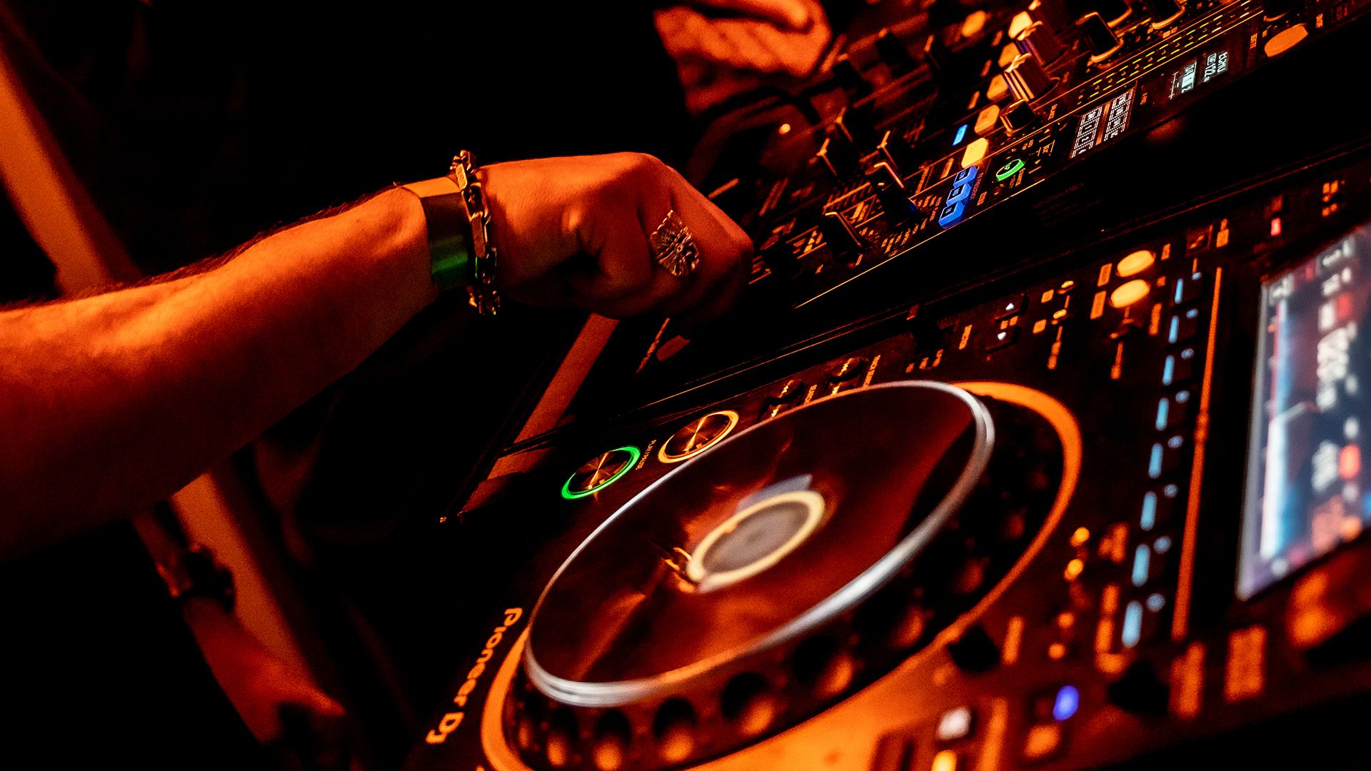 SUSHISAMBA DJ playing on turntables