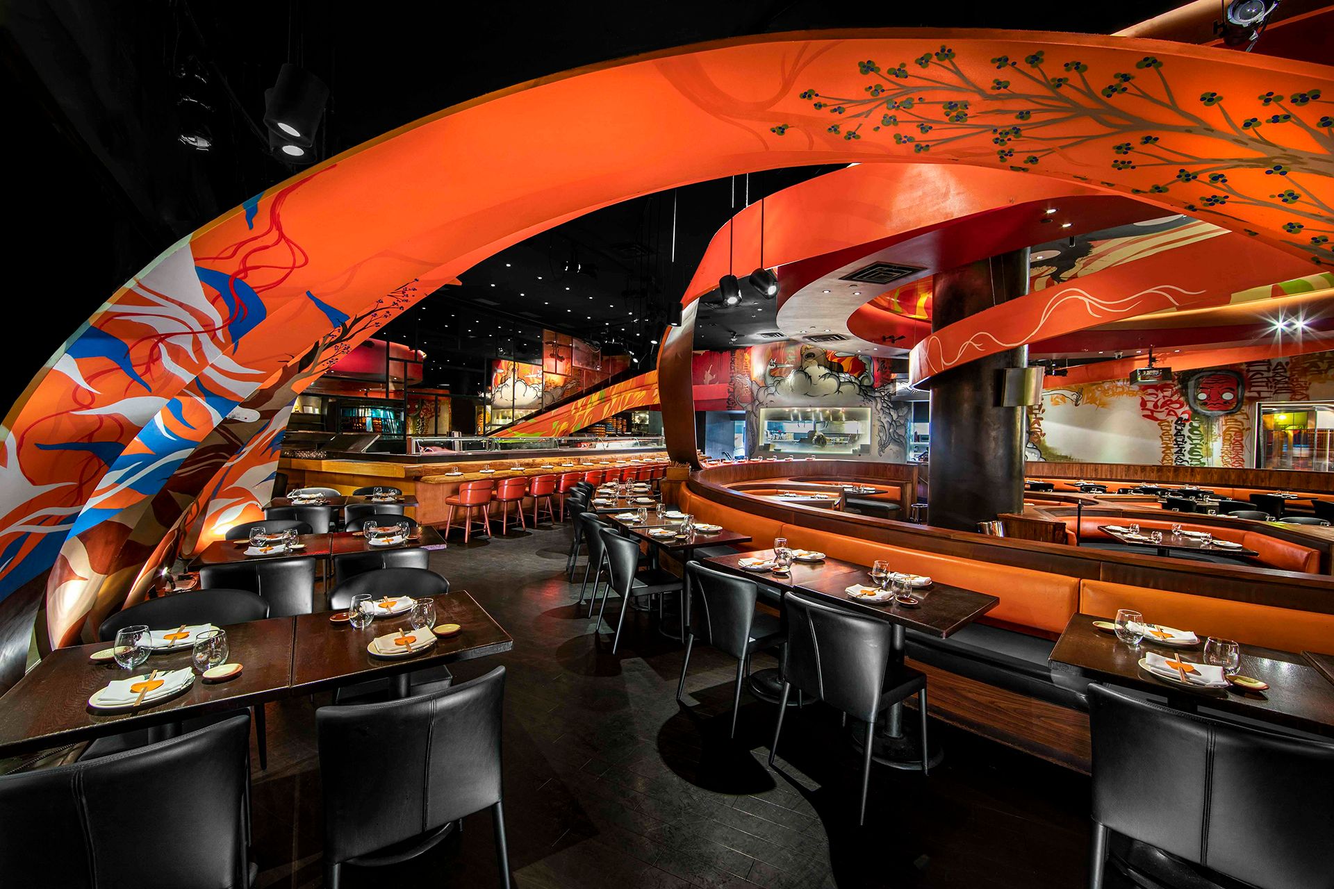 Explore SUSHISAMBA Las Vegas restaurant at the Venetian Resort. Las Vegas Dining room with large orange sculptural ribbon installation