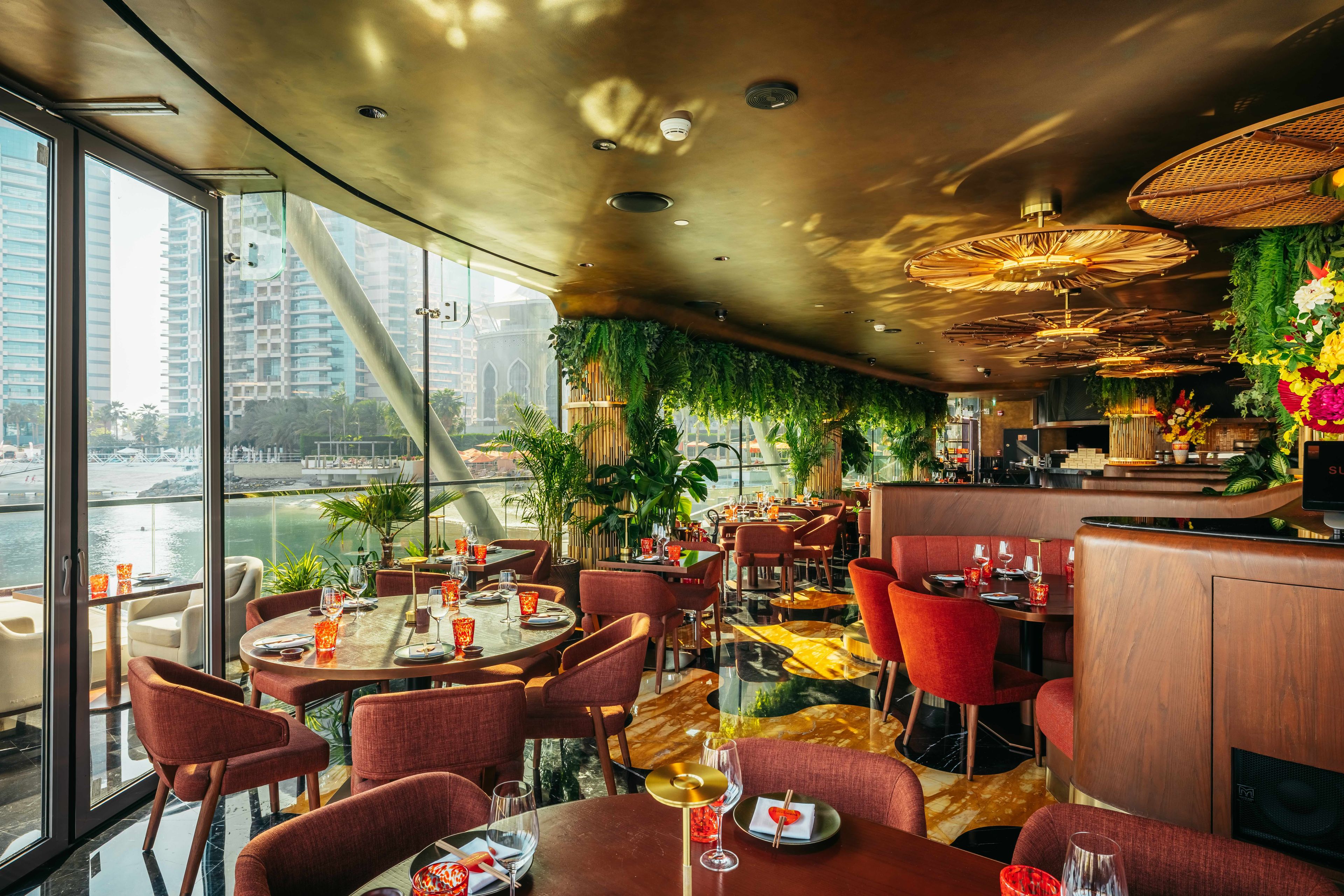 SUSHISAMBA Abu Dhabi dining room in daytime with a view of waterfront