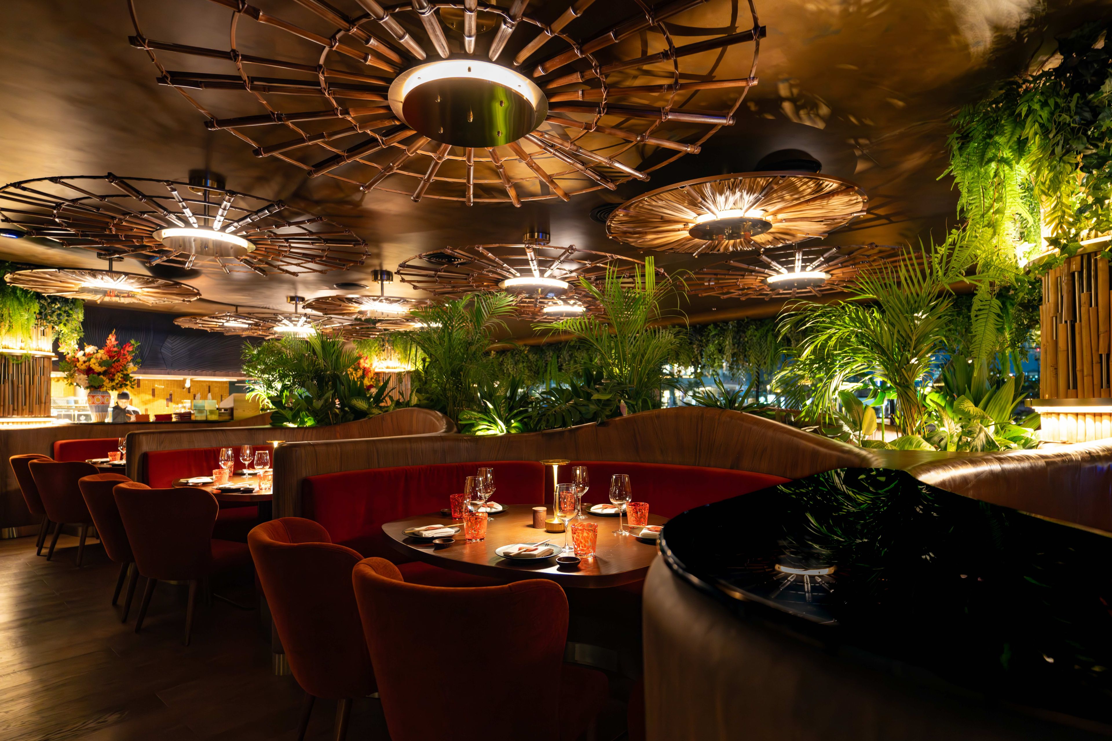 SUSHISAMBA Abu Dhabi interior at night, with table set for dinner