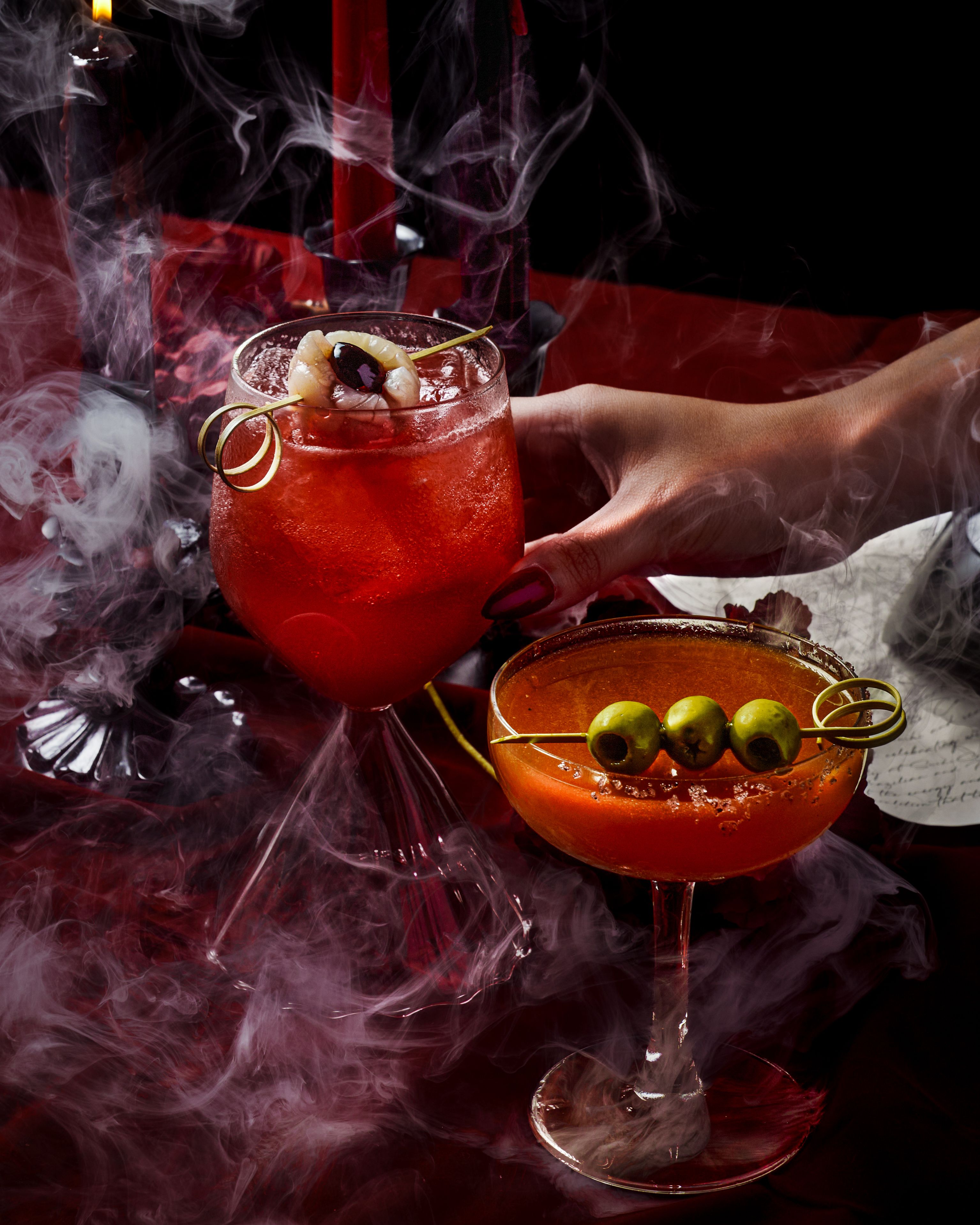 SUSHISAMBA Singapore Halloween cocktails with hand